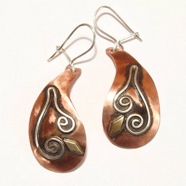 Teardrop shaped copper earring with a spiral design and black patina