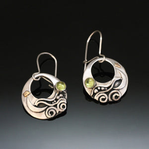round silver earrings with water scene, sun, crescent moon, black patina, 4mm peridot 14k gold fill accents, punched out hole