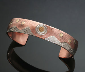 Copper bracelet, mountain landscape with moon sun 14k gold fill circles, spirals embossed into silver mountains