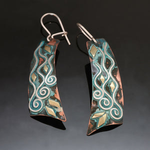 long copper earrings with 3 silver spirals, waves and bass accents with blue/green patina