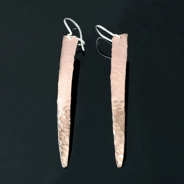 long and narrow hammered copper Earrings shaped to hug the face