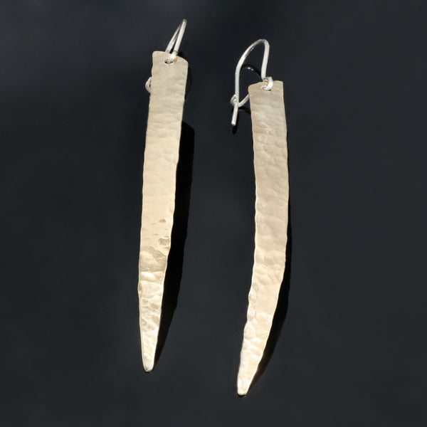 long and narrow hammered brass Earrings shaped to hug the face