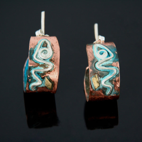 copper studs in hoop shape with silver spiral, brass and blue patina