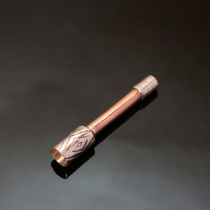 small straight pipe with copper stem and silver bowl embossed with diamond pattern.