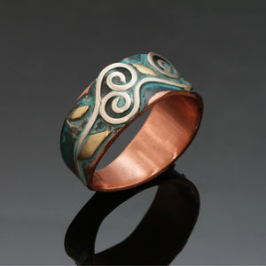 copper ring with silver spirals and brass accents blue patina