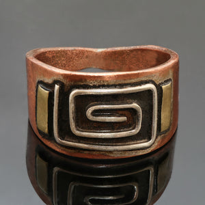 copper ring with long square silver spirals and brass accents black patina