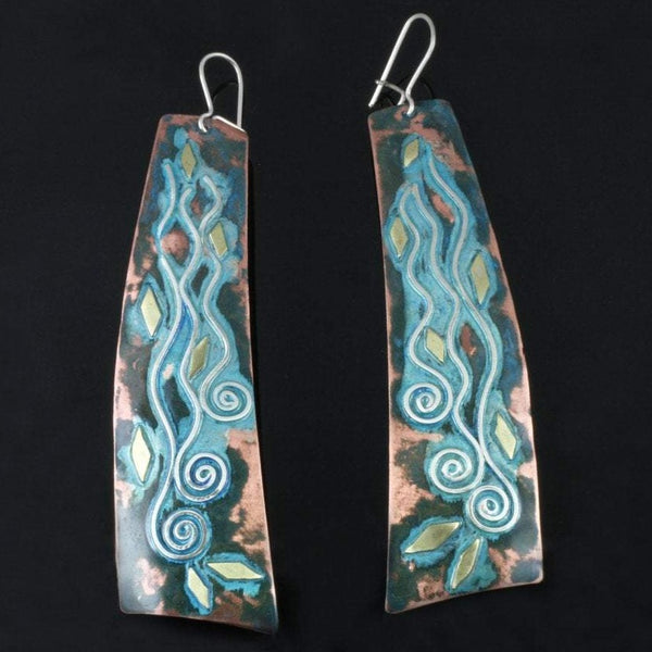 Very long copper earrings with 3 silver spirals, waves and bass accents with blue/green patina