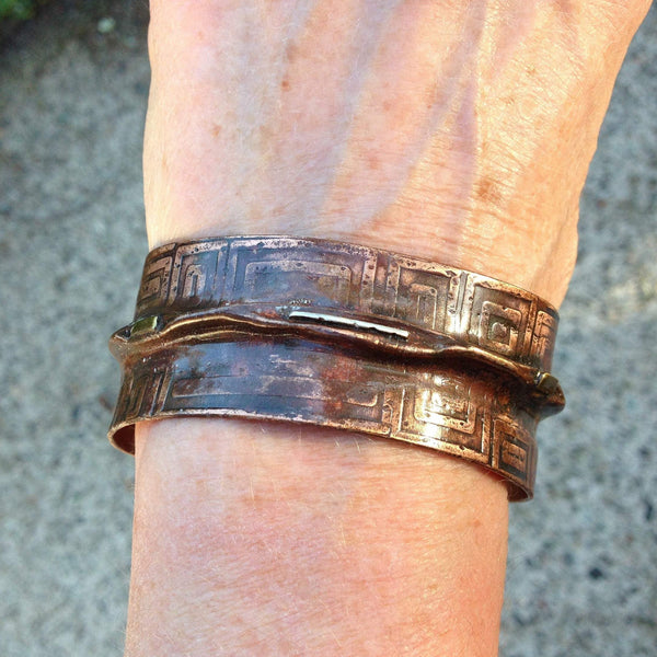 folded copper bracelet with squares pattern embossed, sterling silver with brown copper patina